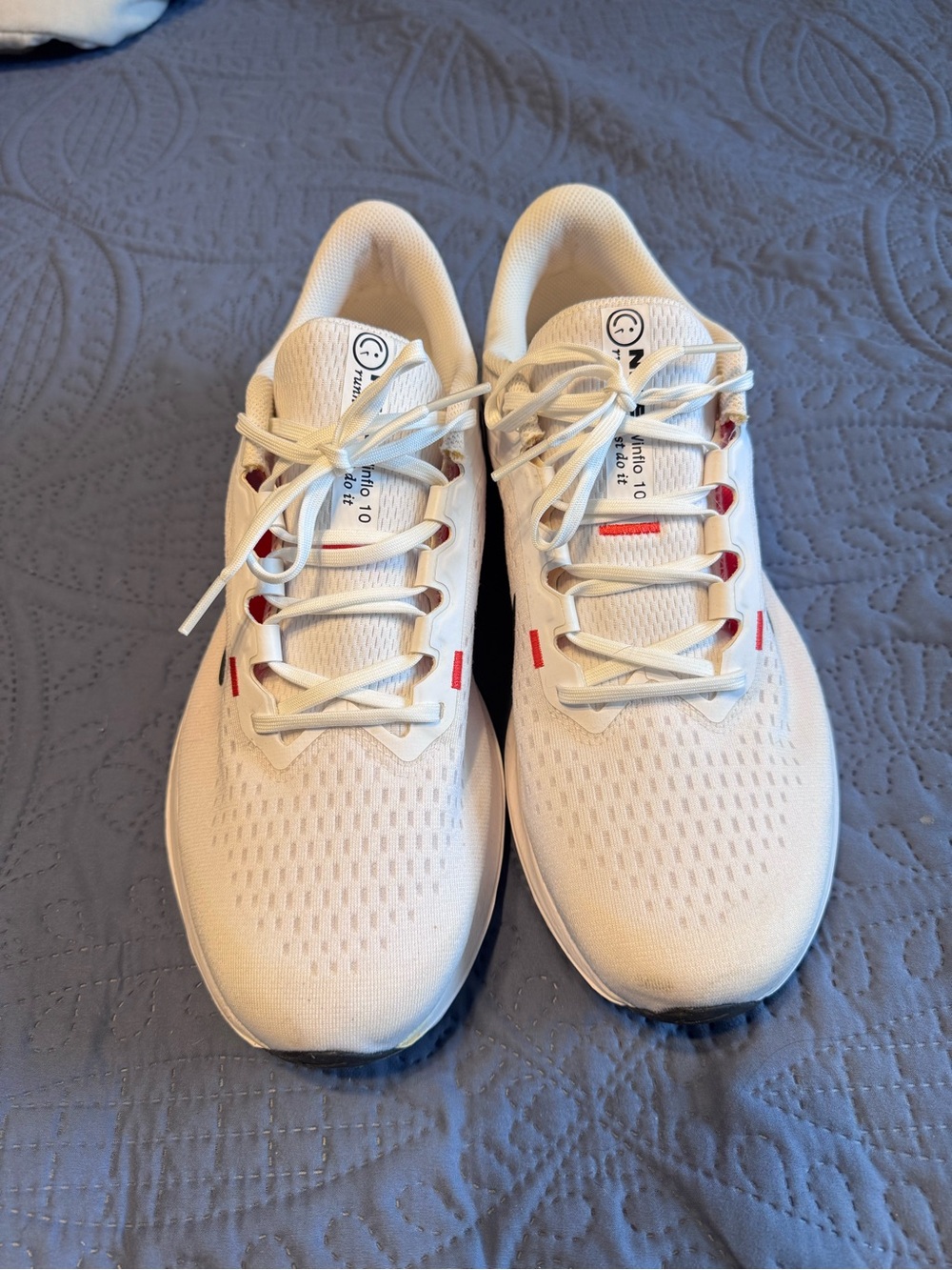 Nike Men's White Running Shoes with Red Accents